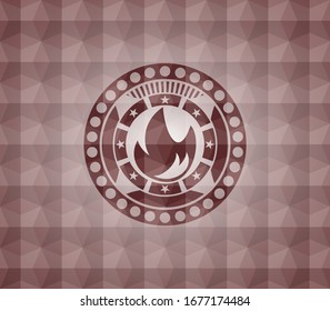 fire icon inside red seamless emblem or badge with abstract geometric polygonal pattern background.