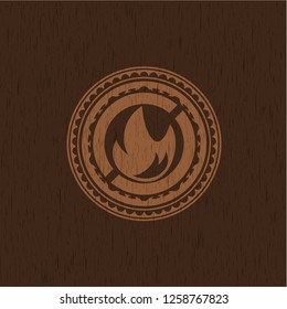 fire icon inside retro style wooden emblem