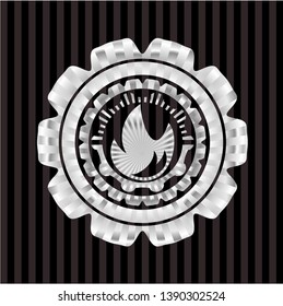 fire icon inside silvery badge or emblem