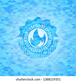 fire icon inside sky blue emblem with mosaic background