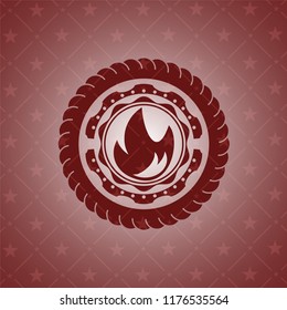 fire icon inside vintage red emblem
