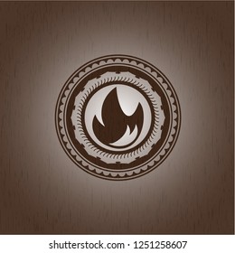 fire icon inside wood emblem. Retro