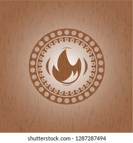 fire icon inside wood emblem. Vintage.