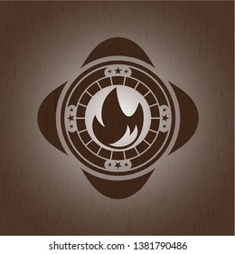 fire icon inside wood emblem. Vintage.
