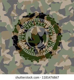 fire icon on camouflaged texture