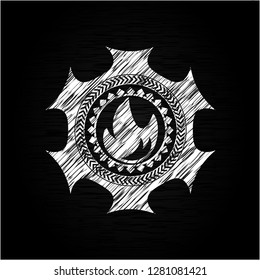 fire icon on chalkboard