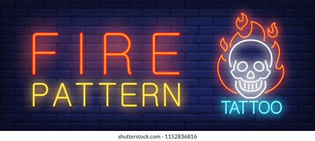 Fire pattern neon text skull on fire. Tattoo salon or studio concept. Advertisement design. Night bright neon sign, colorful billboard, light banner. Vector illustration in neon style.