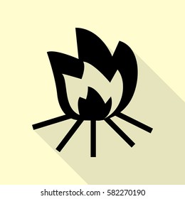 Fire sign. Black icon with flat style shadow path on cream background.