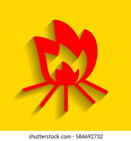 Fire sign. Vector. Red icon with soft shadow on golden background.