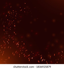 Fire sparks burning against dark background. Red hot particles flying in the air. Blazing flame rising up. Motion of dust glowing pieces. Firestorm sparkle effect with bokeh lights.