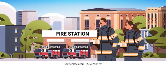 firefighters in uniform standing near fire station building department house facade and red emergency vehicles horizontal