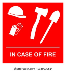Firefighting equipment: helmet, gloves, shovel, axe and the text: in case of fire