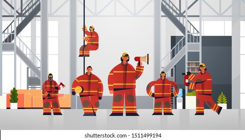 Firemen Team Standing Together Firefighters Wearing Uniform And Helmet Firefighting Emergency Service Concept Modern Fire Department Interior Flat Horizontal Full Length