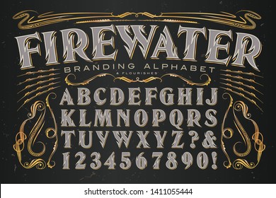 Firewater branding alphabet is a heavily stylized serif capitals font with zig zag lines reminiscent of flames. Ideal set of graphics and letters for alcohol branding.