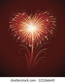 Firework in a shape of heart on the red background.