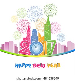 fireworks display for happy new year 2017 above the city with clock 