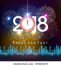 fireworks display for happy new year 2018 above the city with clock 