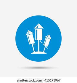 Fireworks rockets sign icon. Explosive pyrotechnic device symbol. Blue circle button with icon. Vector