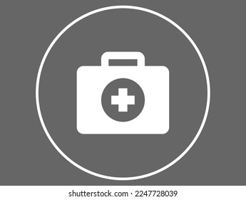 First aid. Emergency briefcase, hospital cross isolated on dark background