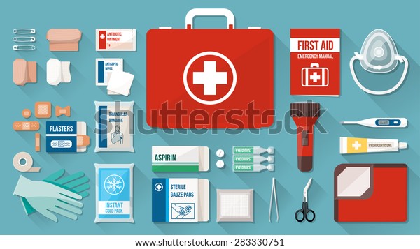 First aid kit box with medical equipment\
and medications for emergency, objects top\
view