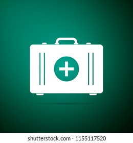 First aid kit icon isolated on green background. Medical box with cross. Medical equipment for emergency. Healthcare concept. Flat design. Vector Illustration