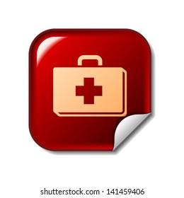 First aid kit icon on red sticker