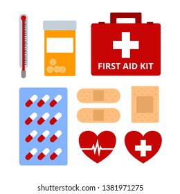 First aid kit include sticking plaster thermometer tablet pills and red box