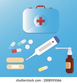 First aid kit: tablets, pills, thermometer, plasters, spray.