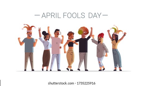 first april fool day mix race people wearing funny jester hats glasses mustache and clown hat holiday celebration concept men women group standing together horizontal poster full length vector