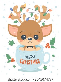 First Christmas baby-boy reindeer sitting in the blue cup. Cute joyful deer animal in the mug. Happy Holiday cartoon character hand drawing. Holly berries, garland in antlers. Vector illustration.