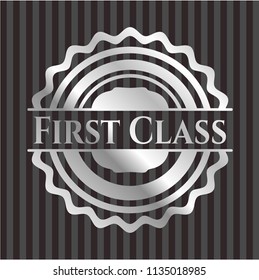 First Class silvery emblem or badge