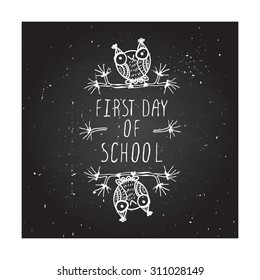 First Day Of School. Hand-sketched Typographic Element With Cute Little Owls On Chalkboard Background. 