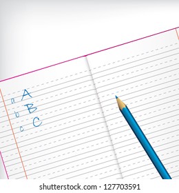 First grade copybook with blue pencil and white backdrop