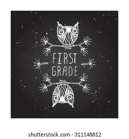 First grade. Hand-sketched typographic element with cute little owls on chalkboard background. 
