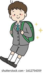 First grader school boy with school bag and uniform