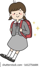 First grader school girl with school bag and uniform