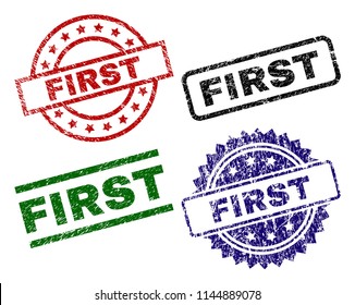 FIRST seal prints with corroded surface. Black, green,red,blue vector rubber prints of FIRST caption with corroded texture. Rubber seals with round, rectangle, rosette shapes.