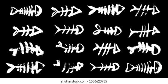 Fish bone skeletons set, hand painted with ink brush stroke, on black background. Grunge vector illustration