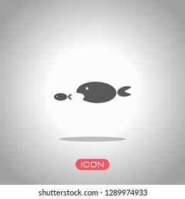 fish eating fist. Icon under spotlight. Gray background