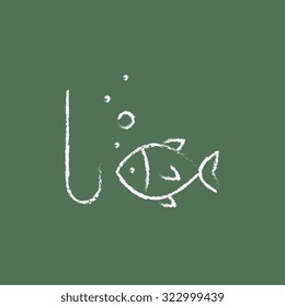 Fish with hook hand drawn in chalk on a blackboard vector white icon isolated on a green background.