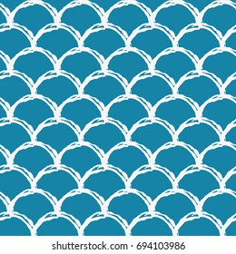 Fish scale seamless pattern. Reptile, dragon skin texture. Tillable background for your fabric, textile design, wrapping paper, swimwear or wallpaper. Blue mermaid tail with fish scale underwater.