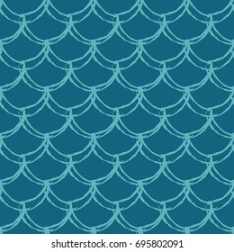 Fish scale seamless pattern. Reptile, dragon skin texture. Tillable background for your fabric, textile design, wrapping paper, swimwear or wallpaper. Blue mermaid tail with fish scale underwater.