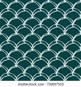Fish scale seamless pattern. Reptile, dragon skin texture. Tillable background for your fabric, textile design, wrapping paper, swimwear or wallpaper. Blue mermaid tail with fish scale underwater.