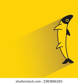fish with shadow on yellow background