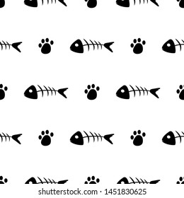 Fish skeleton and cat tracks seamless vector pattern