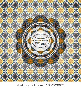fishbowl with fish icon inside arabic style badge. Arabesque decoration.