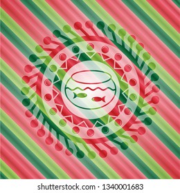 fishbowl with fish icon inside christmas emblem background.