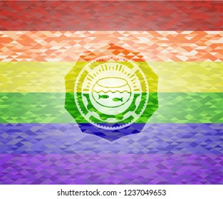 fishbowl with fish icon inside emblem on mosaic background with the colors of the LGBT flag