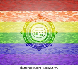 fishbowl with fish icon inside emblem on mosaic background with the colors of the LGBT flag
