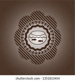 fishbowl with fish icon inside retro wood emblem